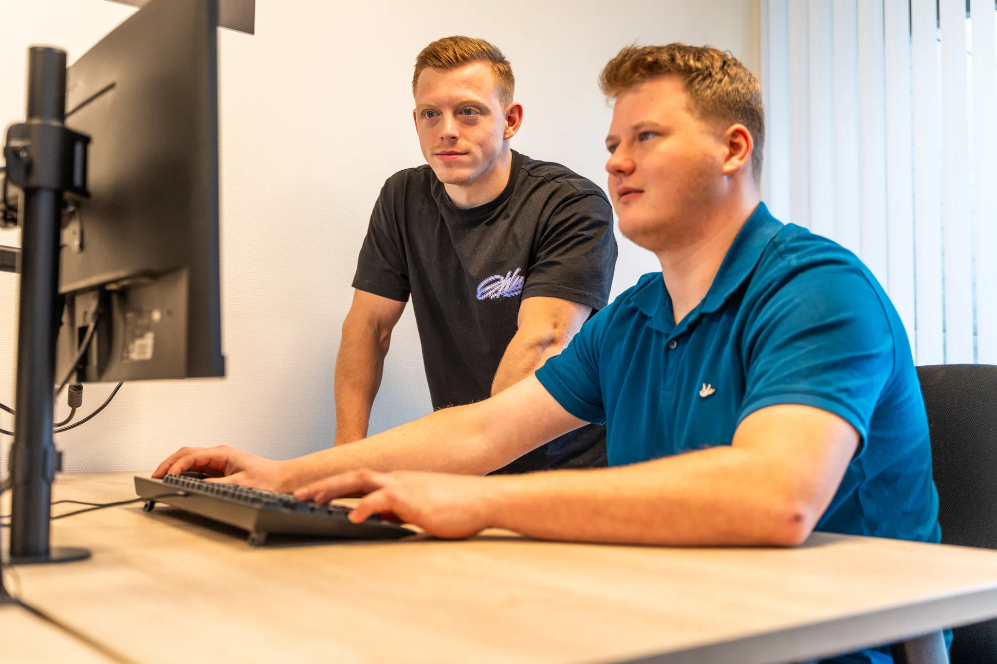Twee specialisten werken samen aan een ransomware-casus
